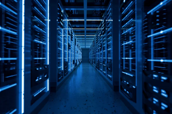 Engineer in data centre looking at lockable rack